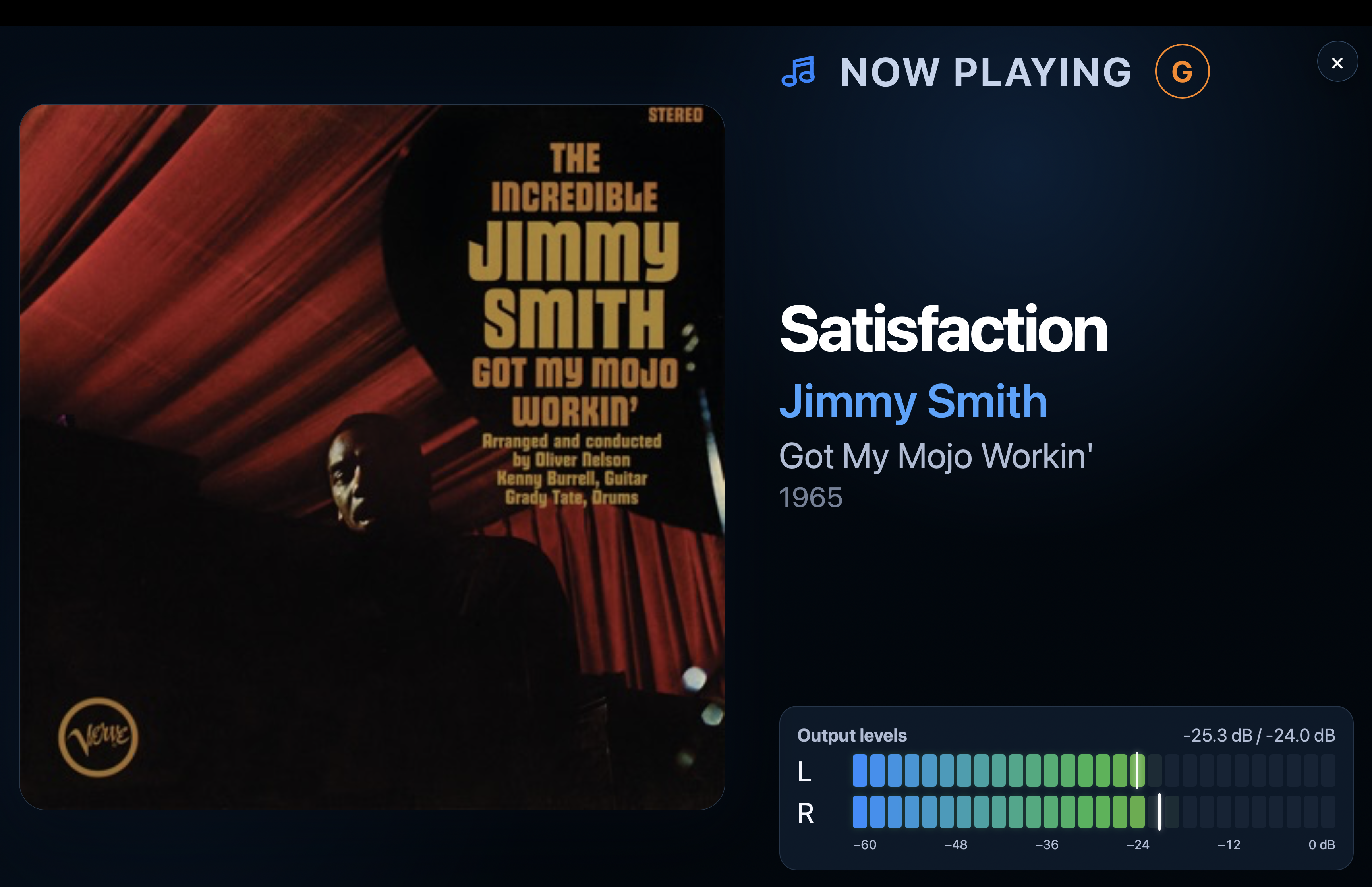Full-screen Now Playing with recognised artwork, track details, media grade and live stereo meters.